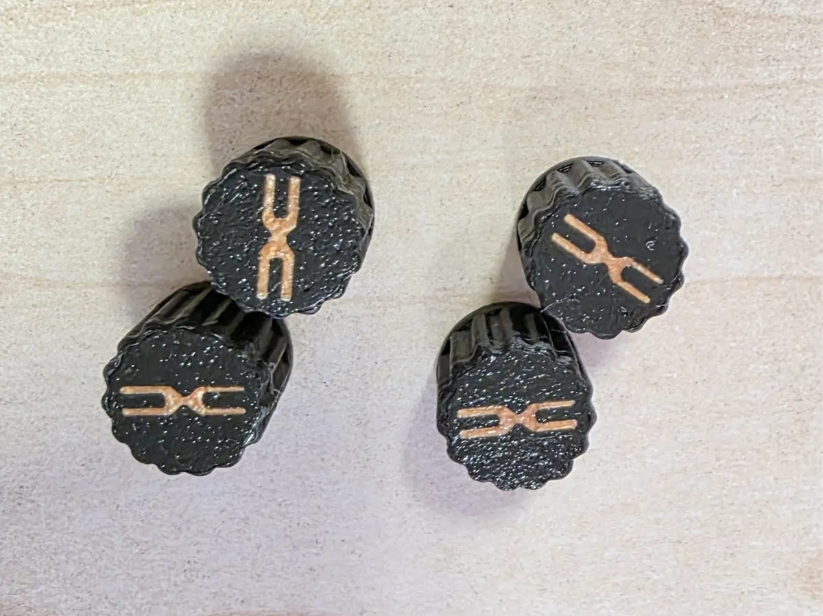 Dacia valve caps 3D printed — Schnapps Caps Australia